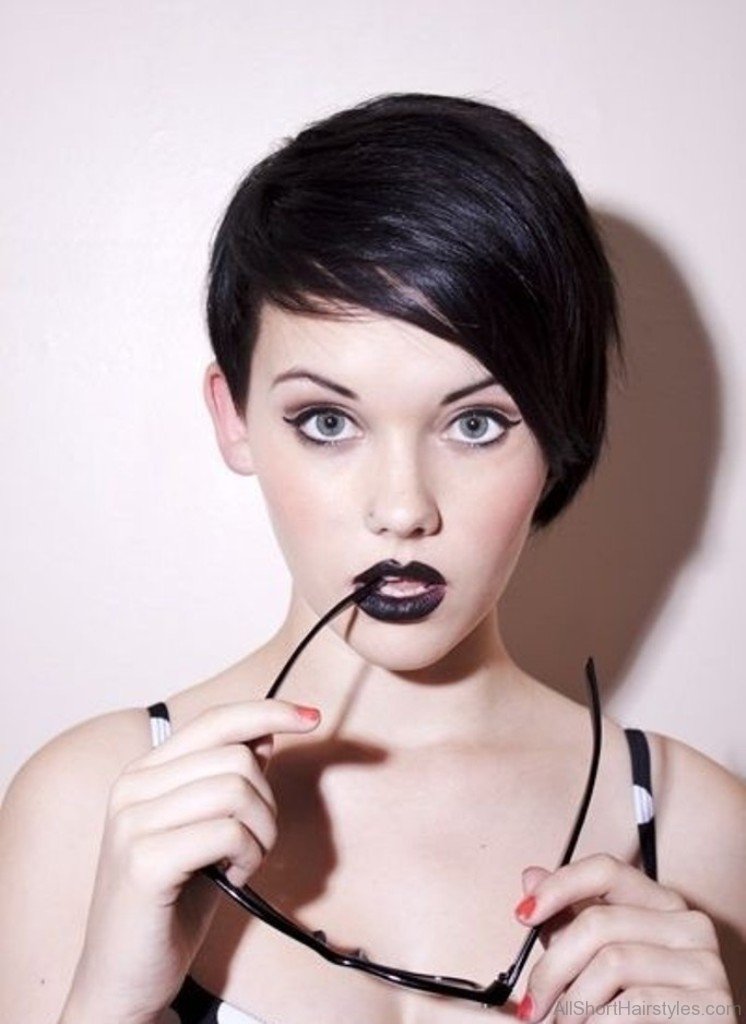 Short haired beauty plays with fan images